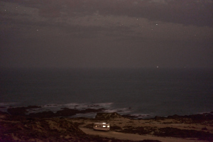 Fine art nightscape photographs of a motorhome traveling along the ocean
